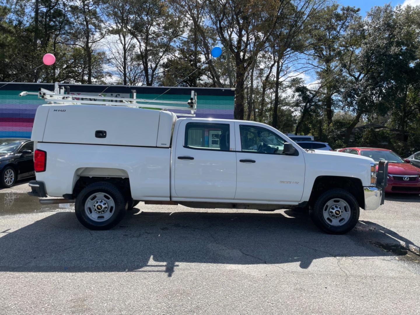 2015 WHITE CHEVROLET SILVERADO 2500H WORK TRUCK (1GC1KUEG7FF) with an 6.0L engine, Automatic transmission, located at 5103 Dorchester Rd., Charleston, SC, 29418-5607, (843) 767-1122, 36.245171, -115.228050 - Local Trade-in with Easy Clean Vinyl Interior, Backup Camera, AM/FM/AUX, Spacious Rear Seat, Power Windows, Power Locks, Power Mirrors, Utility Cab with Storage All Around, Pull Out Bed Storage, Ladder Rack, Safety Strobe Lights, Keyless Entry, Tow Package with Brake Assist, 4-Wheel Drive, Brush Gua - Photo#7